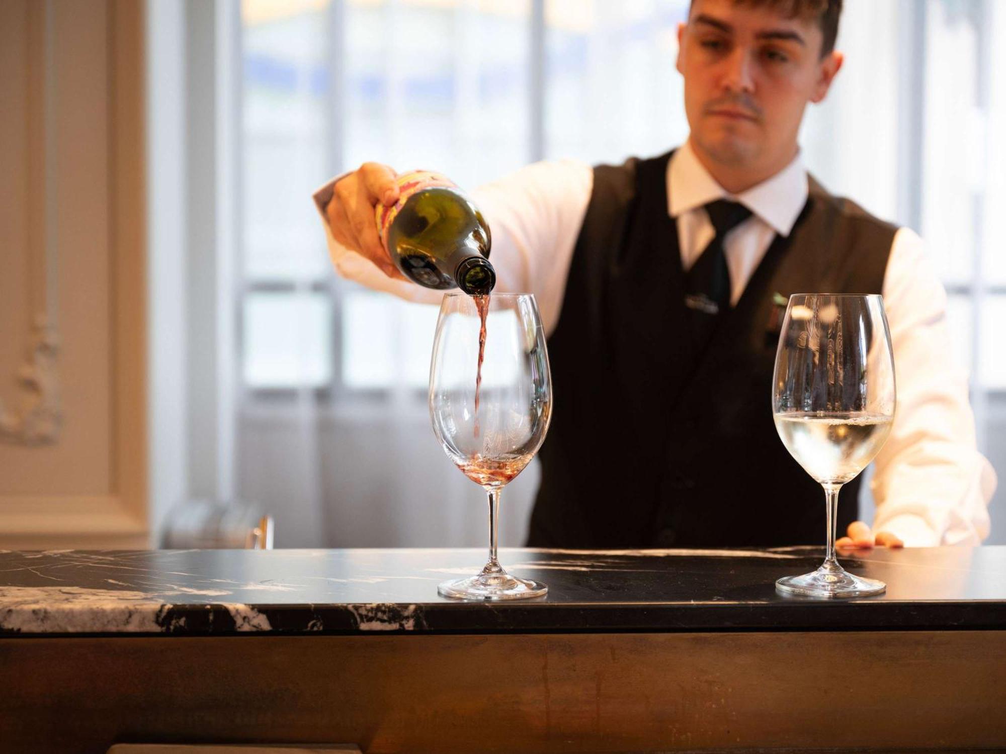 The Playford Adelaide - Mgallery Εξωτερικό φωτογραφία A sommelier pouring wine